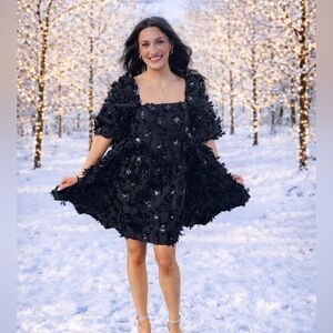 Storia Elegant Black Dress with Floral Details